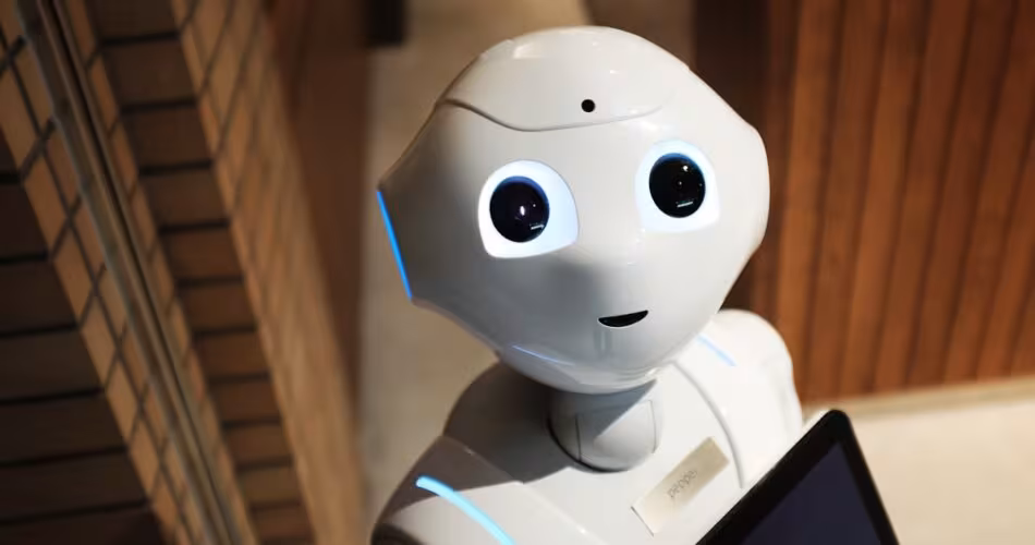 AI robot typing on keyboard simulating human behavior