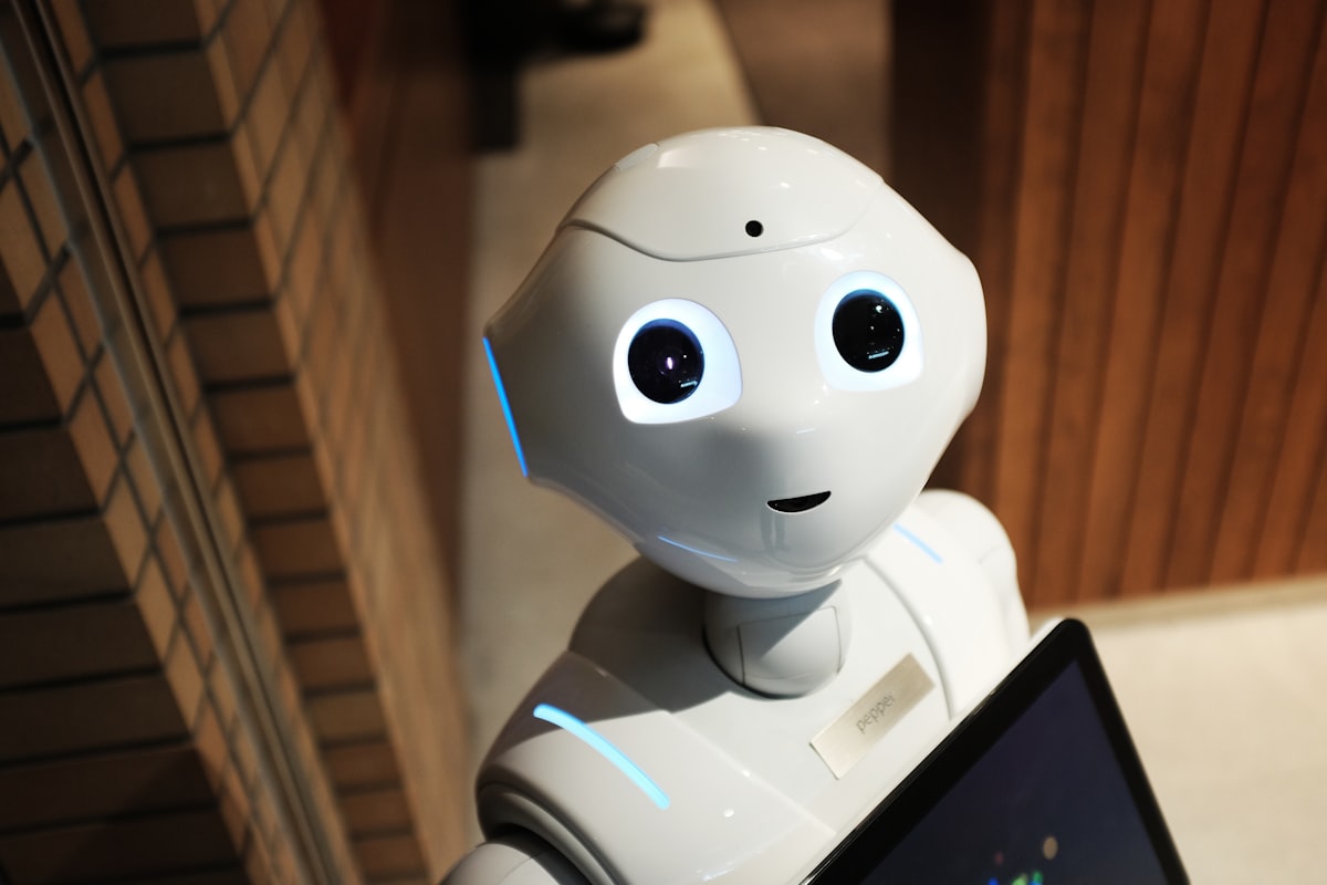 AI robot typing on keyboard simulating human behavior