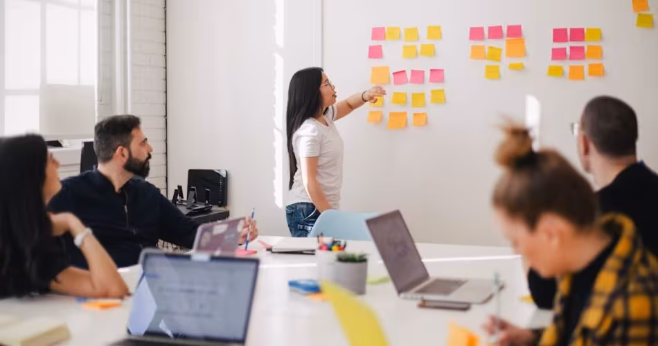 Fraud prevention team analyzing automated attack patterns
