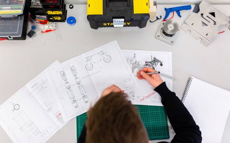 Person repairing smartphone with tools showing repairability concept for sustainable electronics