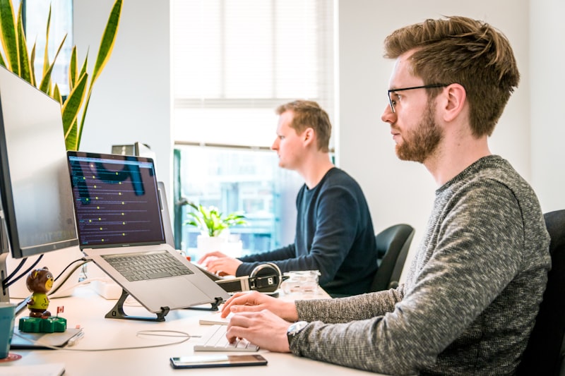 Startup founders reviewing security policies and access control procedures