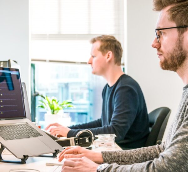 Startup team implementing zero trust security on a budget with modern cloud tools and identity verification